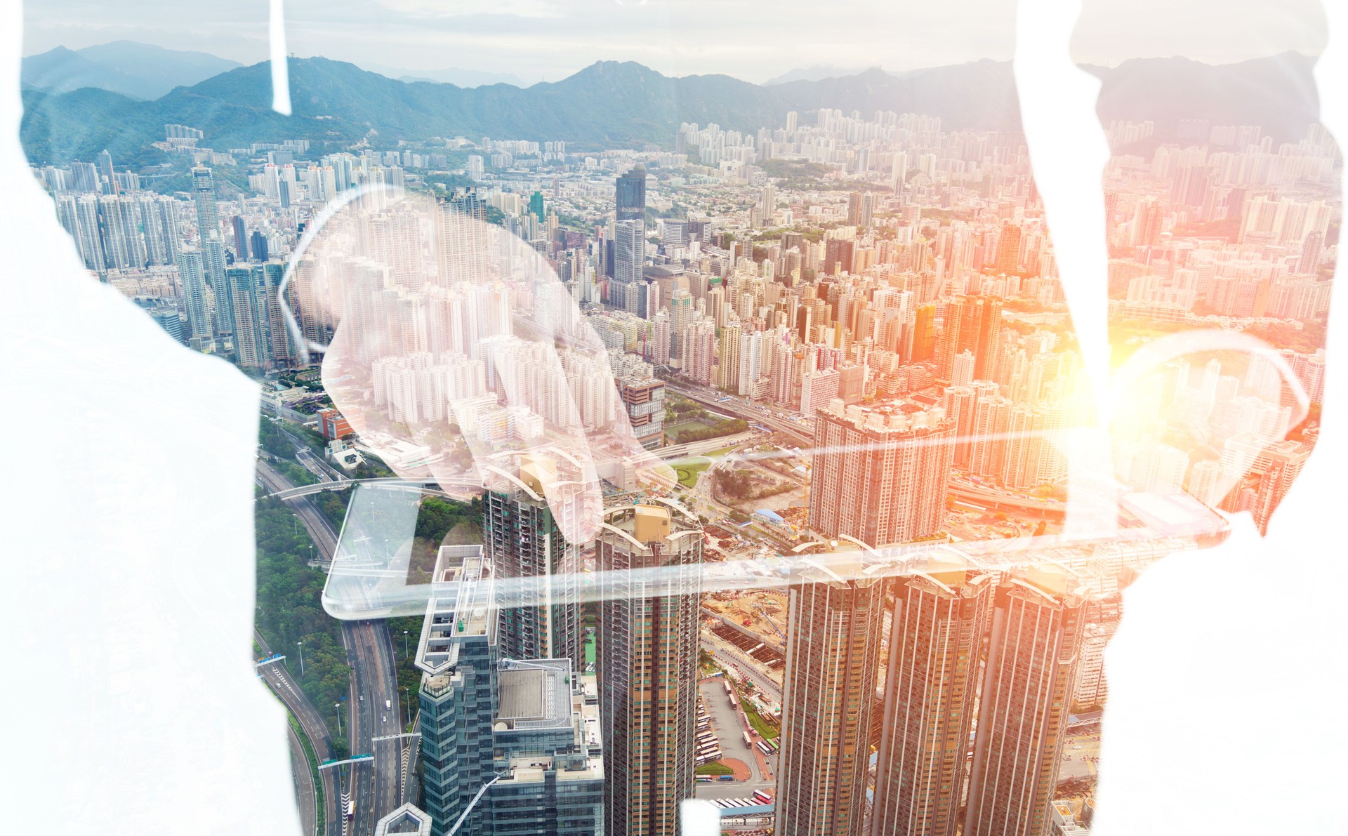 Multiple exposure of businesswoman touching digital tablet